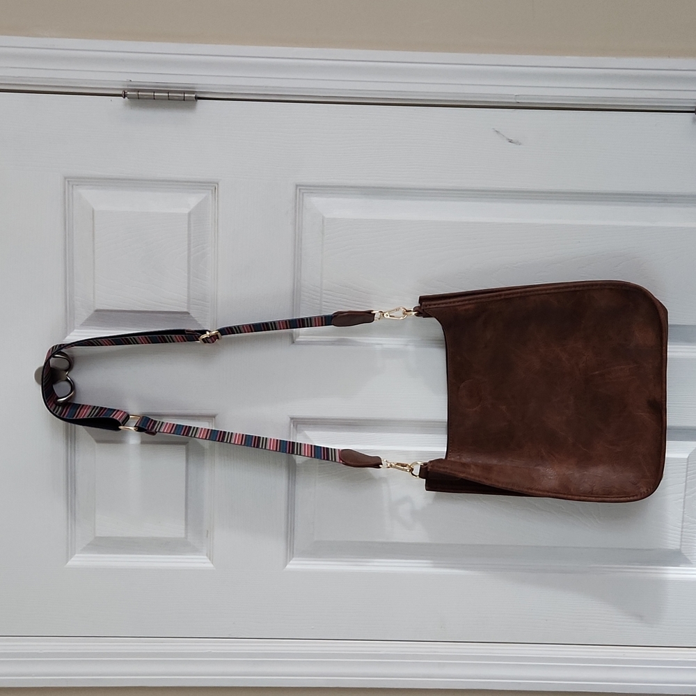 Brown faux leather purse with adjustable guitar strap